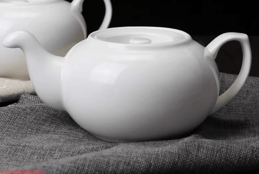 Durable Classic White Ceramic olecranon Teapot - OMECA wholesale LTD.